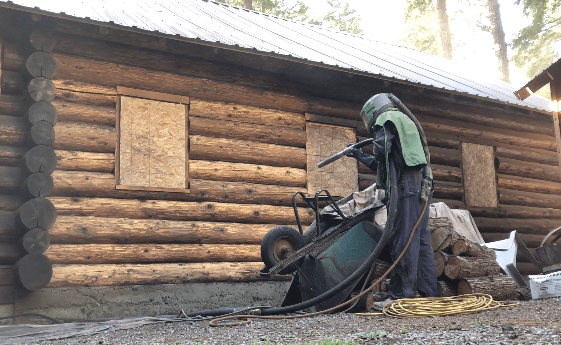 sandblasting a log home in Hayden, Idaho